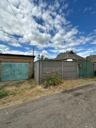 Продается дом в городе Марганец - фото 1