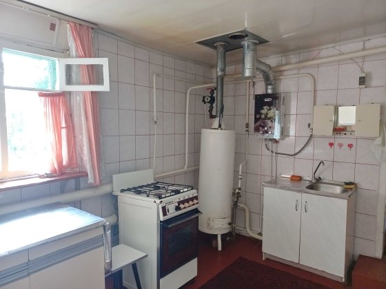 Продам часть дома с гаражом, статус квартиры