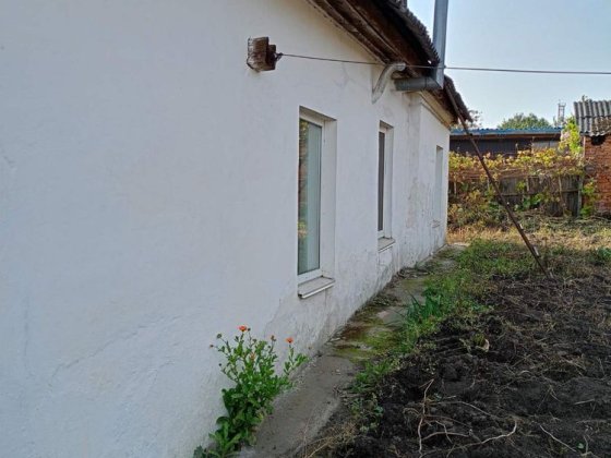 Продаж половини будинку в центрі міста Радомишль 100 км від Києва Радомишль