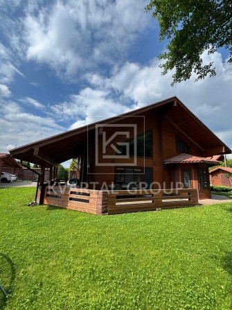 Дерев'яний будинок 200 м² біля Києва | Ліс, річка, 12 соток - фото 1