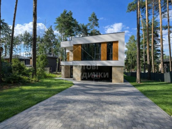 Крутезний будинок в стилі Hi-Tech, з топовим розташуванням у лісі Ходосівка