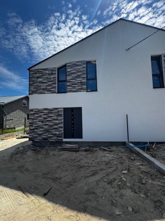 Продаж 2 поверхового котеджу (спарка) в Рудне, Львівська міська рада. - фото 1