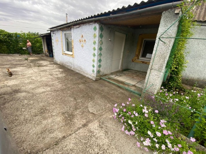 Продам будинок 120 м², 10 соток, гараж, погріб | м. Снігурівка - фото 1