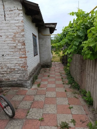 Продається частина газифікованного будинку по вул. Загородній, район четвертої  школи. - фото 1