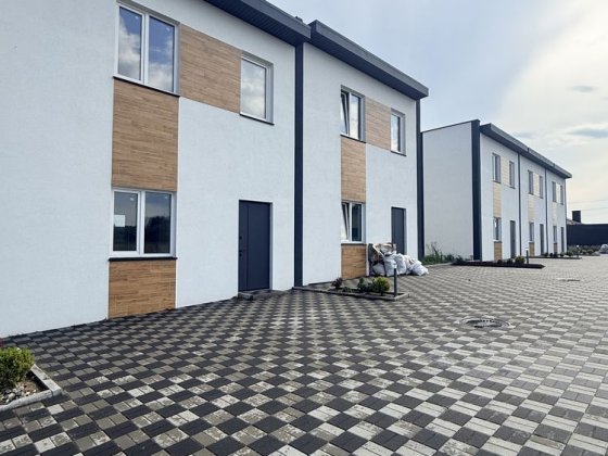 Продаж таунхаус 75 м² з власним двориком Закритий комплекс 2 паркомісця Синергія поруч Ирпень