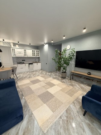 Таунхаус 134 м² з ремонтом у КМ Green Place, Ірпінь — $183 000. Басейн, гараж. Мінімальне оформлення - фото 1