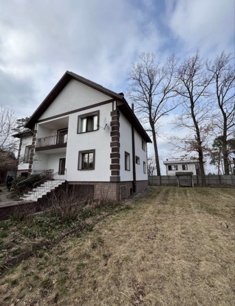 Будинок 287 м² у центрі Ірпеня | 10 соток | Центральні комунікації | Гараж | мінімальне оформлення - фото 1