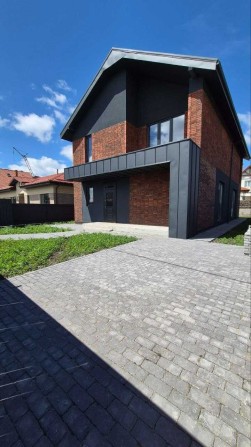 Двоповерховий будинок 187 м² з центральними комунікаціями біля лісу в Ірпені - фото 1