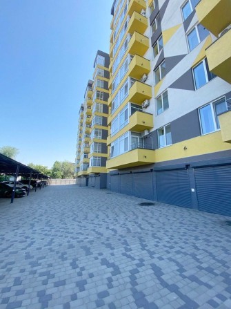 Продам паркомісце з електрозарядкою у Новобудові охорона Слобожанський пр-т/Калнишевського - фото 1