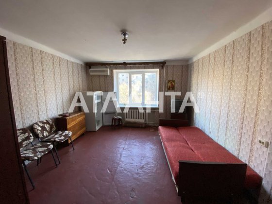 Просторная комната в кирпичном доме по ул. Жолио Кюри Одесса