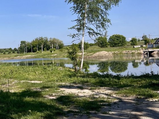 КУТОВА  ДІЛЯНКА  біля озера з гарним  краєвидом! Микуличи