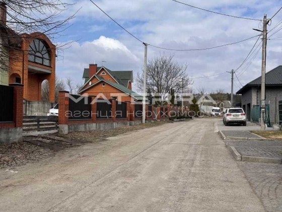 Музичі двохфасадна ділянка 12 соток з соснами Музычи