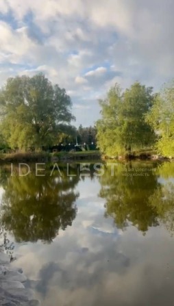 Ексклюзивна ділянка 21  сотки на березі озера в Нових Безрадичах - фото 1