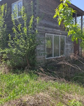 Продам земельну ділянку з будинком з брусу - фото 1