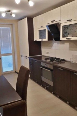 Продам 2к квартиру в новобудові, 70кв.м, 6/9 пов, цегла, котел, на Подолі - фото 1