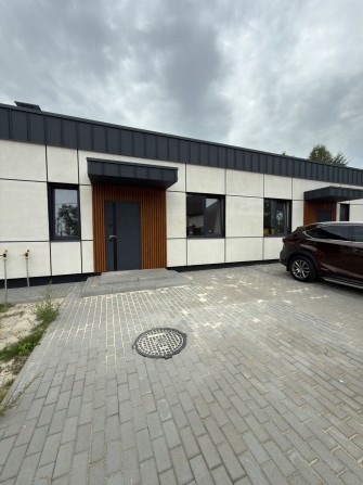 Продам таунхаус 62 м² у Гостомелі — $50 000. Ділянка 1,6 сотки, Газ заведений. Готовий до ремонту. В - фото 1