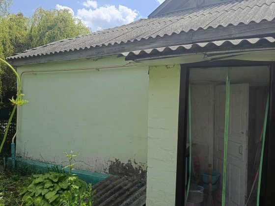 Продам 1/2 будинку на ділянці 6 соток м.Зміїв. Центр,вул.Рогатинська Змиев