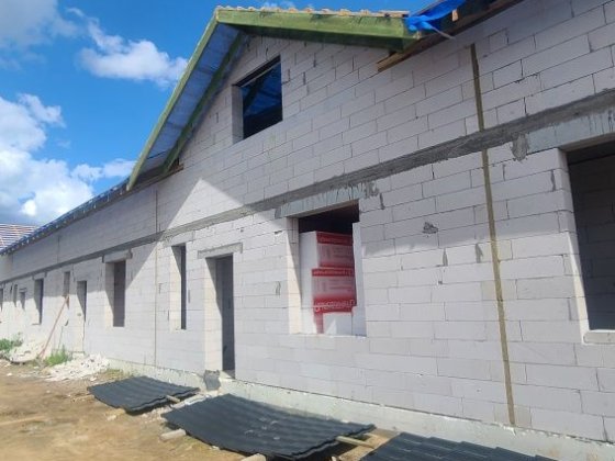 Продам таунхаус в Гостомелі в центрі біля Озера.Ціна від забудовника .Пограми ТАК
