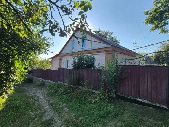 ПРОДАМ половину БУДИНКУ з ОКРЕМИМ двором р-н ЗАРЕМБОВА гребля Умань