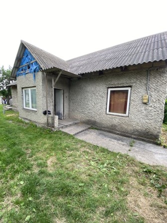 Продається 1/2 частина будинку .м.Хотин. - фото 1