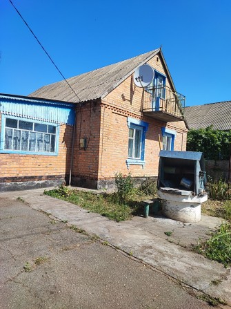 Продаж просторого двоповерхового цегляного будинку в місті Узин. - фото 1