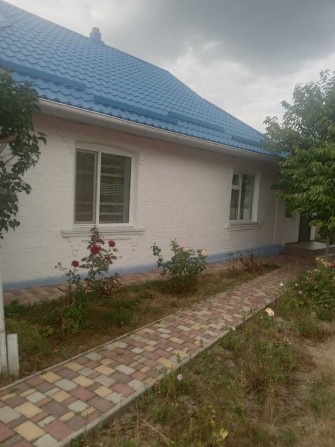 Продається будинок у Таращі - затишний двір, 2 види опалення, власна вода, гараж - фото 1