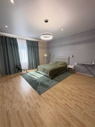 Будинок 338 м² у центрі Бородянки з ділянкою 8 соток - фото 1