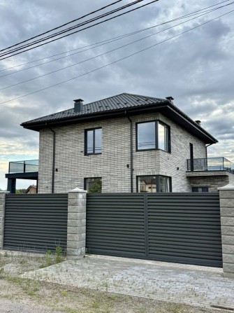 Котедж 153 м² на 12 сотках біля Києва. Лісова зона, сучасне планування - фото 1