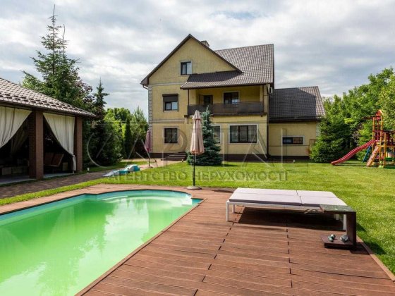Продаж будинку 3 поверхи Мархалівка Фастівський район 16 соток басейн баня гараж 15 км до метро Тере