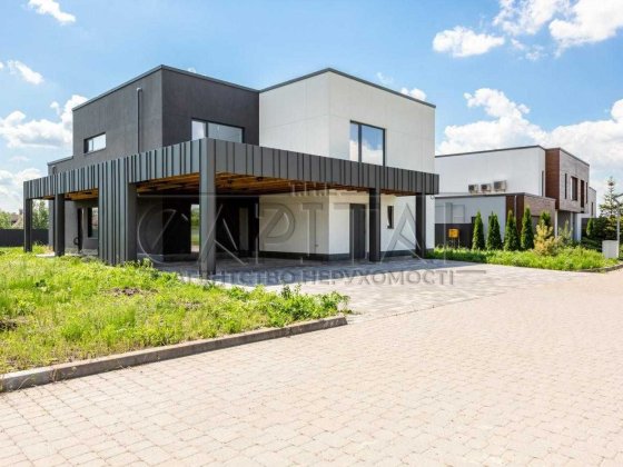 Продаж сучасного будинку з просторою терасою в Green Town на 10 сотках біля Києва Крушинка