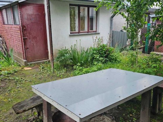 Продаж 2 кім. кВ. ,,особнячного,, типу Рудне гараж+ літня кухня+ 5.1 сот землі Рудне