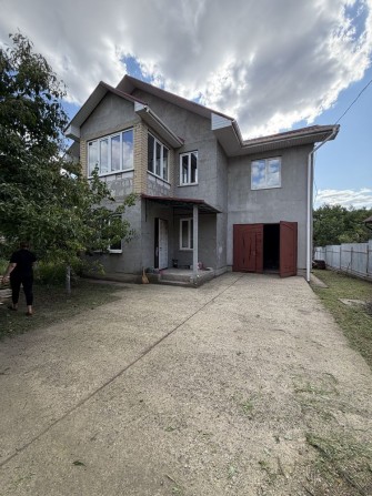 Продам дом с гаражом в центре Авангарда - фото 1