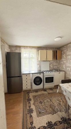 Продам дом с участком в Беляевке - фото 1