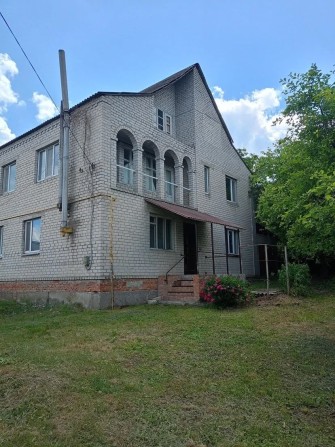Продам 1/2 частину двоповерхового цегляного будинку. - фото 1