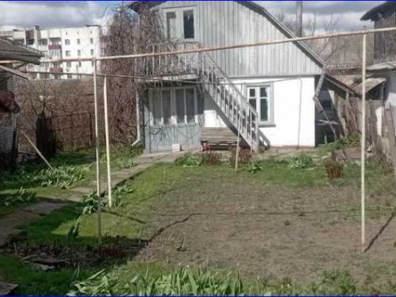 Продам півбудинку з двоповерховою літнею кухнею Золотоноша
