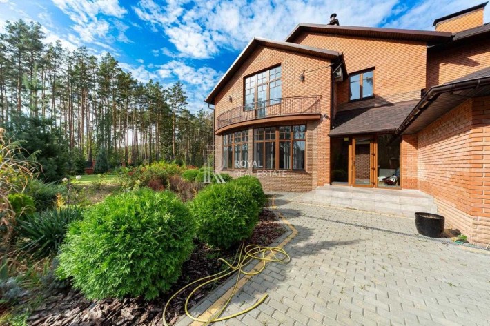 Оренда Будинок Пуща-Водиця 7 кімнат 330 м² 22 сотки Охорона Ліс Озеро Авторський ремонт 3 спальні Га - фото 1