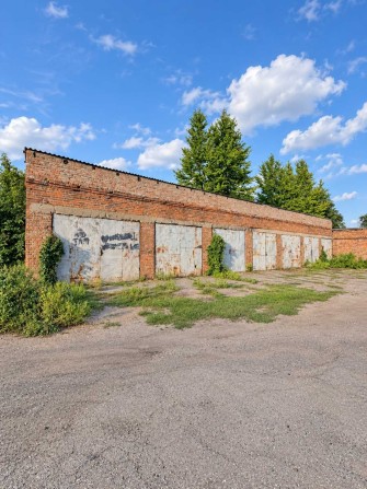 Продам комплекс із 15 гаражів, 567 м² — Ромни - фото 1