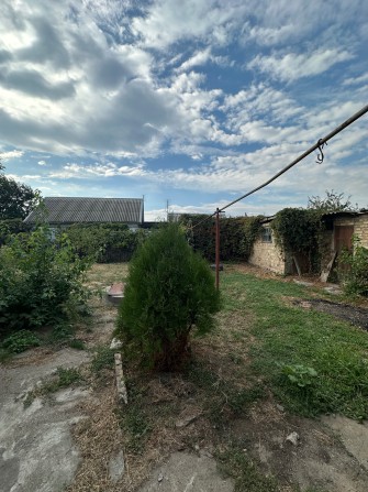 Продается дом в городе Марганец - фото 1