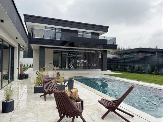 Продаж Будинок Ходосівка 230 м² 4 спальні Ділянка 9 соток Infinity-басейн Тепловий насос Тераси Камі Ходосовка