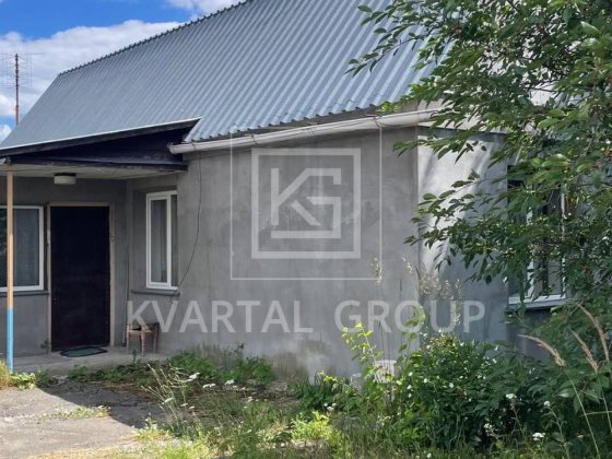 Затишний будинок в центрі міста Бородянка на 12 сотках - комфортне місце для життя та відпочинку Бородянка