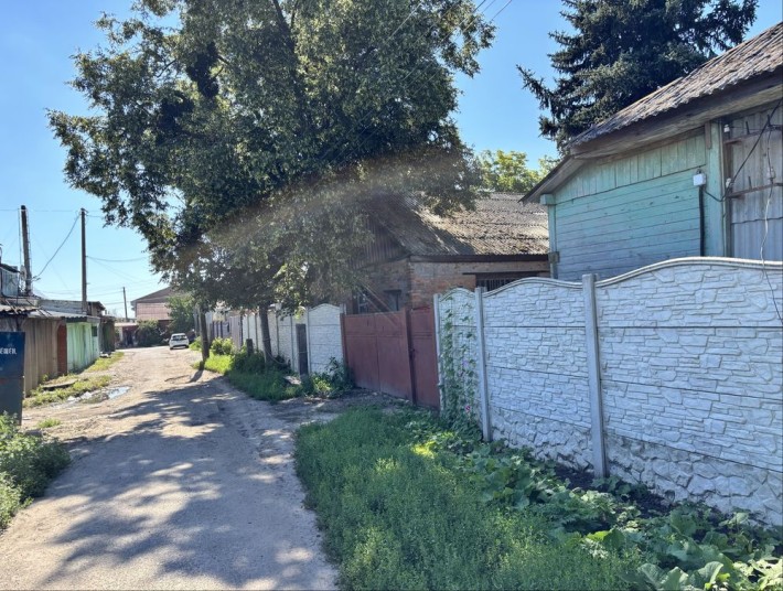2 будинки в самому центрі , одна  велика ділянка смт Нова Водолага - фото 1