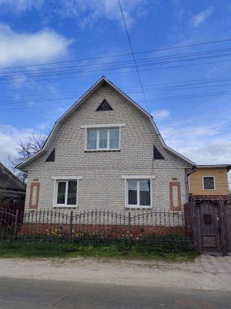 Продається двоповерховий окремий будинок в місті Городня по вулиці Свято-Миколаївській - фото 1