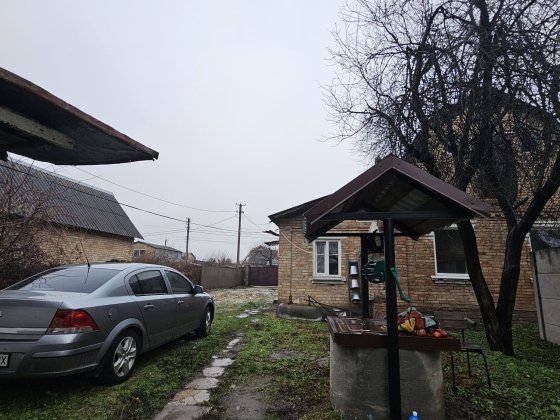 Будинок Буча, та земельна ділянка Буча