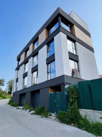 Новий будинок 125 м² біля м. Голосієво, поблизу лісу — власне подвір’я, тераса | $149 000 - фото 1