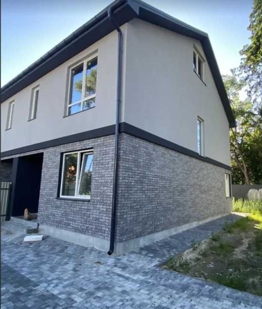 Кутовий таунхаус у Бучі | 120 м² + мансарда | 3 сотки  | Два паркомісця | Газ | $105 000 - фото 1