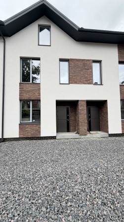 Таунхаус у центрі міста | 84 м² + 35 м² мансарди - фото 1