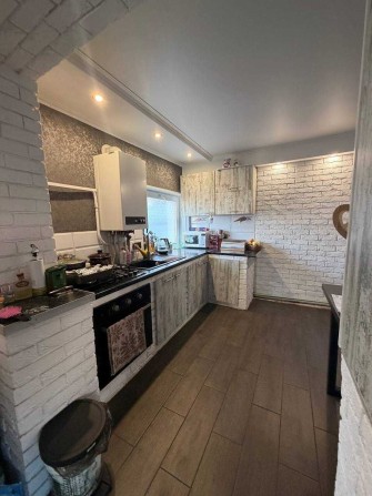 46497 Заходь і живи: 45,8 м² з капремонтом, 8,4 сотки землі та 2 гаражі на Гречанах - фото 1