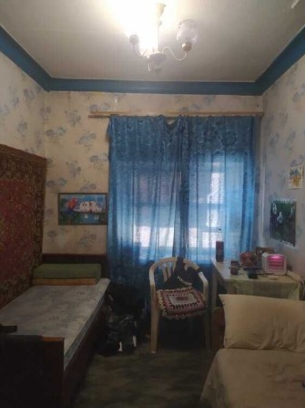 Продаю полдома 3 к 55 кв.м ул.3 Слободская - Чкалова фасад 2 хоз двор гараж - фото 1