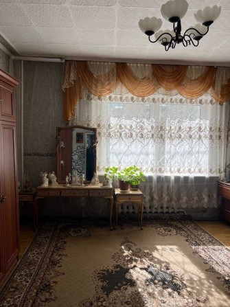 Здається затишна кімната в двоповерховому будинку в центрі міста - фото 1