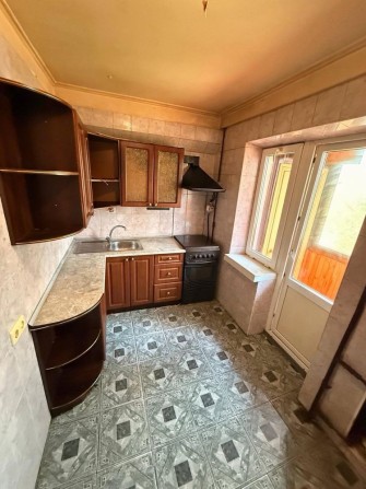 Продаж квартири вул. Поповича Космонавта 16 - фото 1